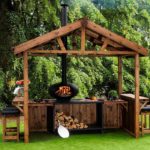 Diseño de jardín cocina y chimenea